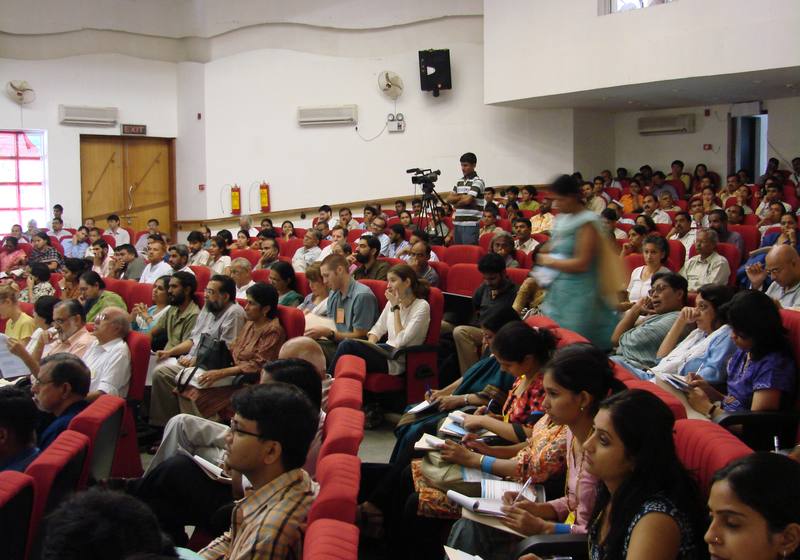 Audience in an auditorium during the tribunal