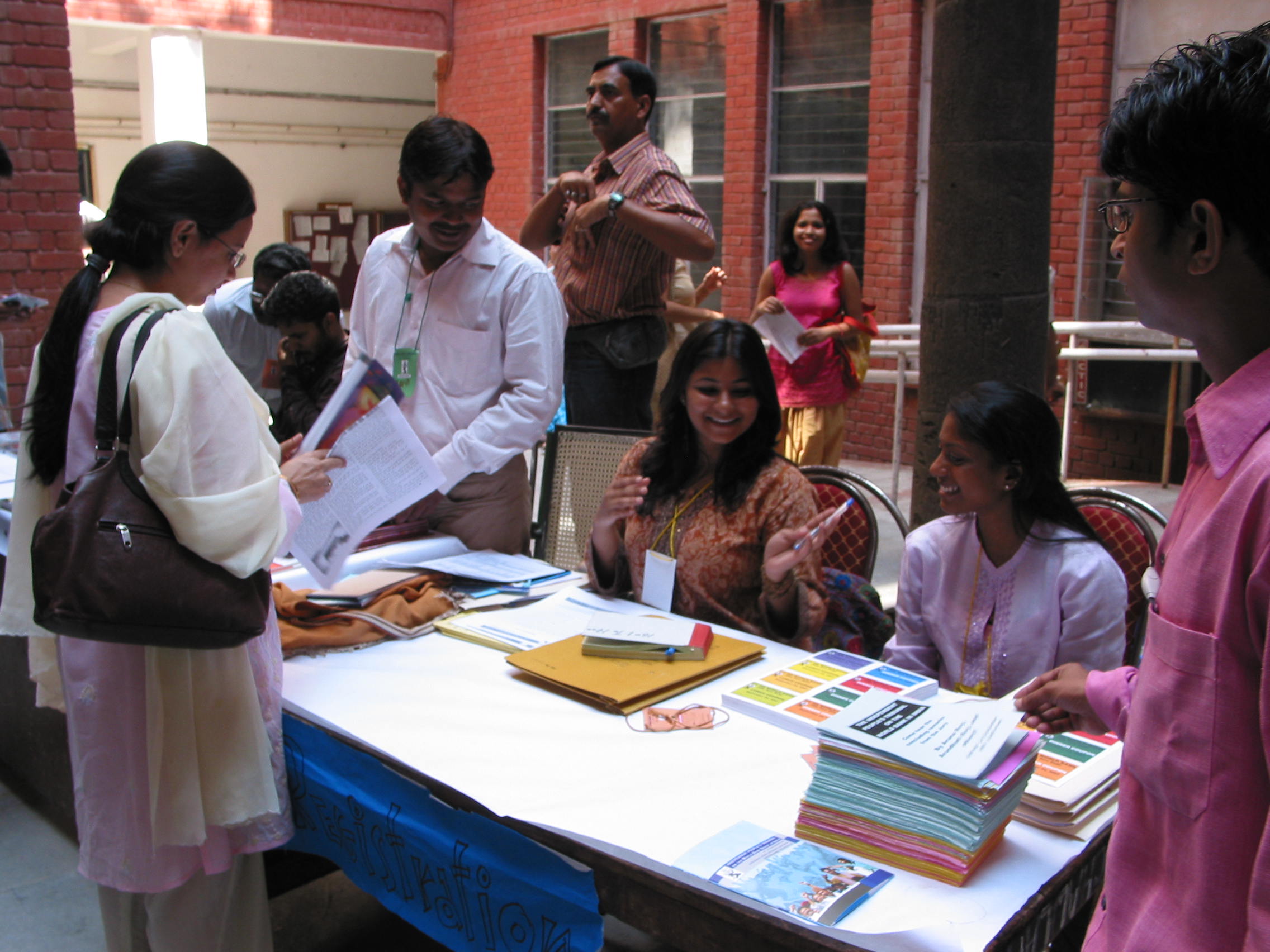Volunteers at the registration desk welcome attendees to the Independent People's Tribunal at JNU, September 2007